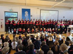 Junior Infants attend their first Assembly. 